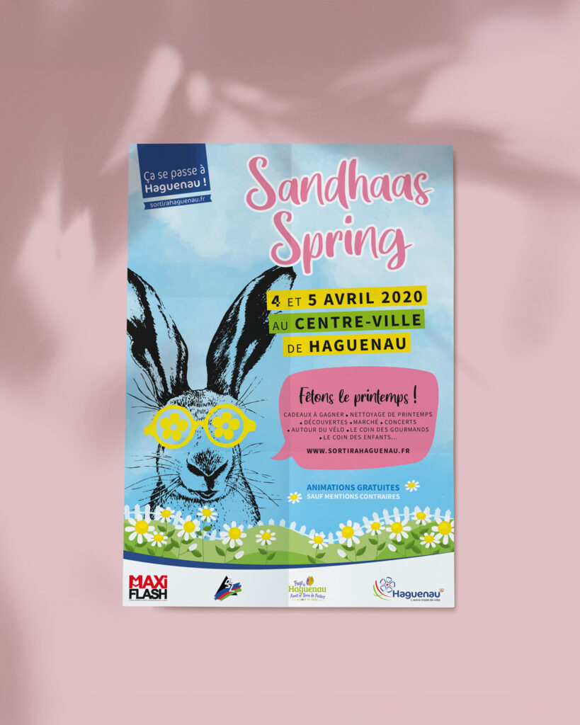 Affiche colorée pour l'événement Sandhaas Spring à Haguenau, mettant en scène un lapin et des éléments printaniers.